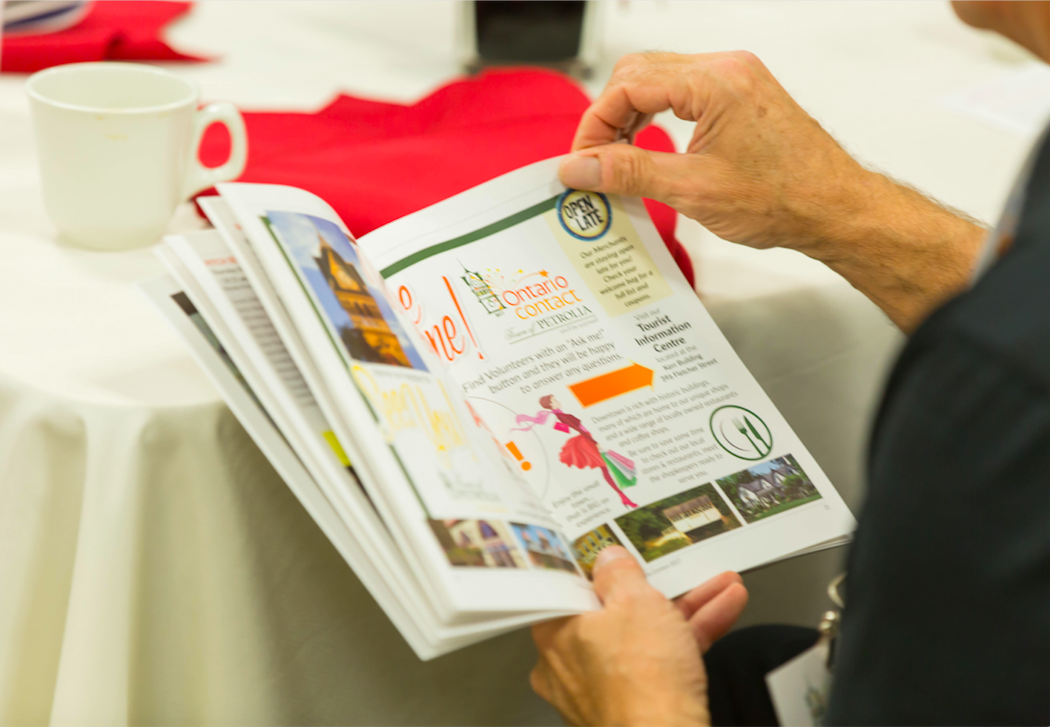 Hands holding Ontario Contact program